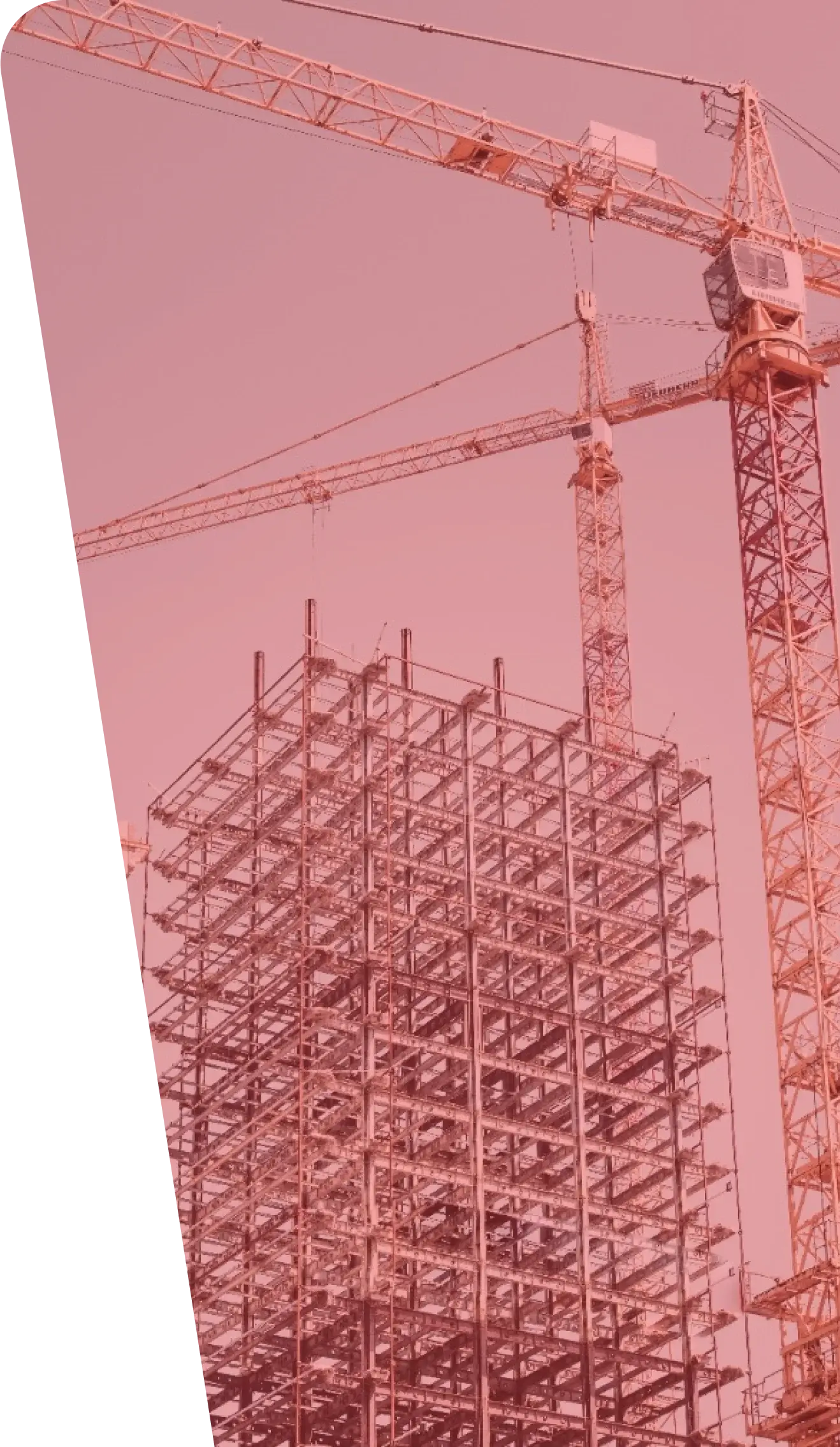 A construction site featuring a tall metal framework of a building in progress, showcasing the critical services provided by the industry. Two large cranes tower over the structure. The image has a pinkish-red tint.